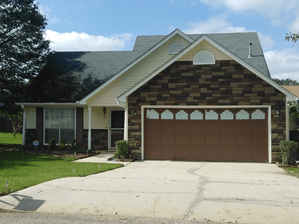 House with brown garage door — Cheyenne, WY — Frontier Siding Supply