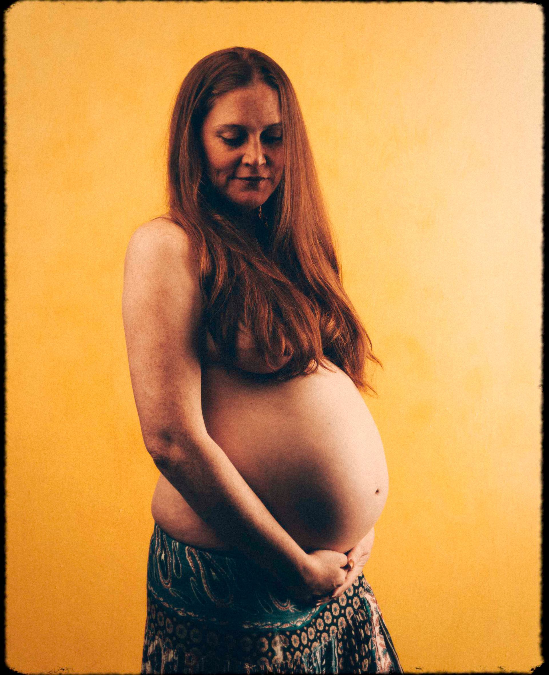 creative and non-traditional maternity portrait of stylish mother in Asheville