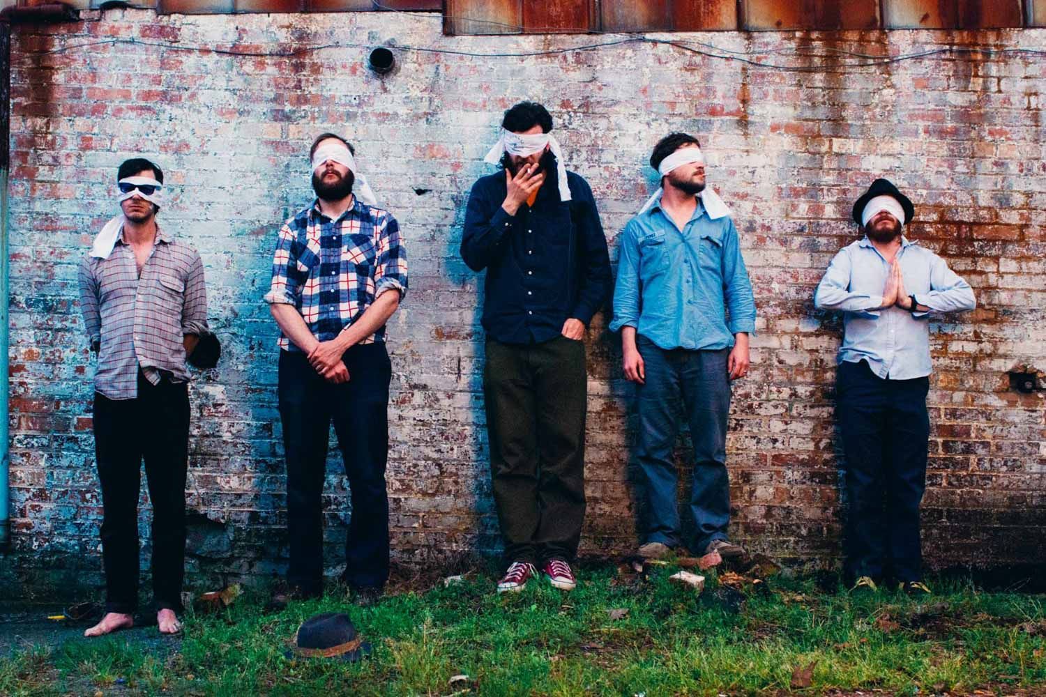 Dr. Dog poses in firing squad for Asheville music photo