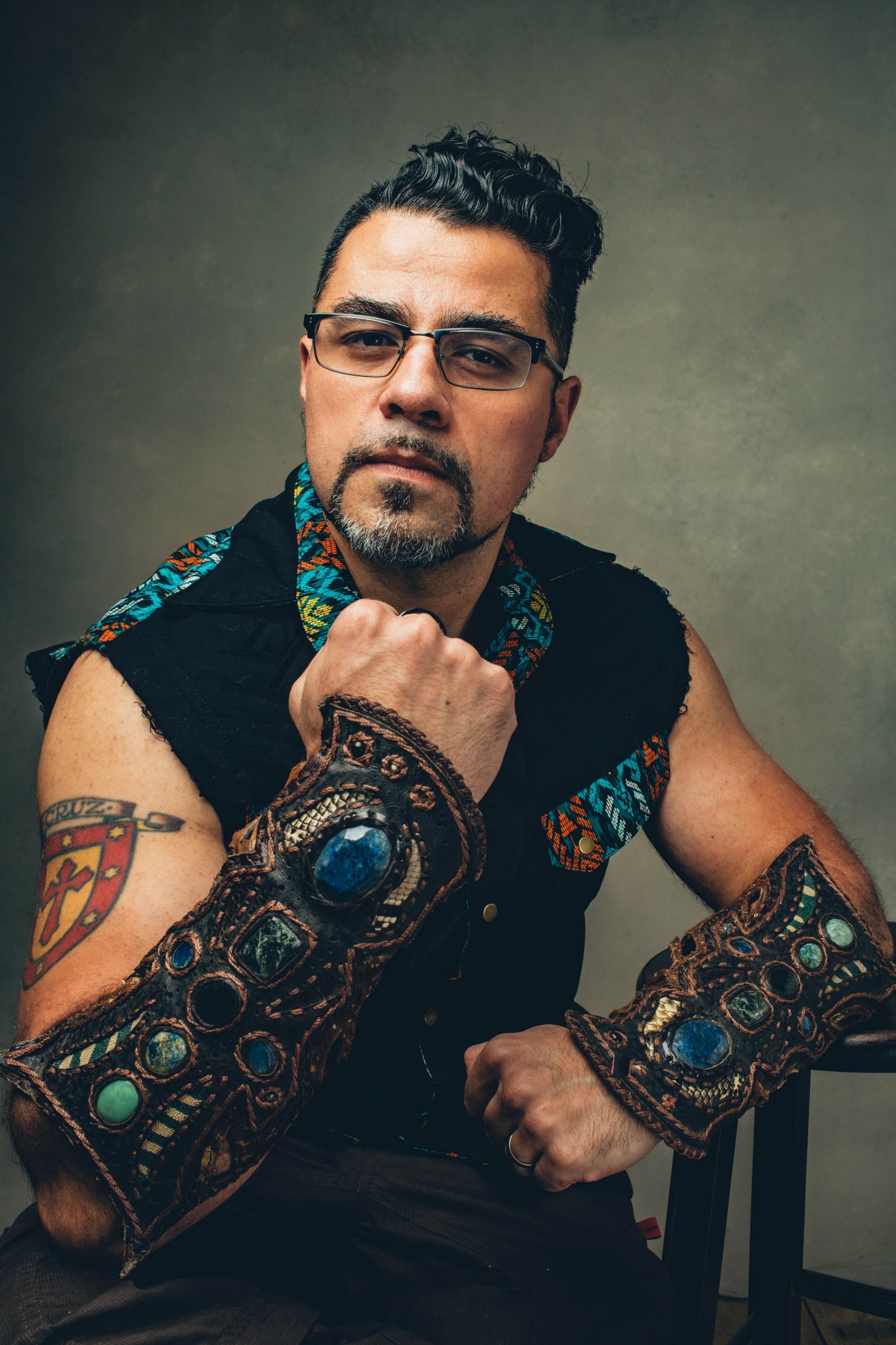 Man poses in studio light, Asheville 