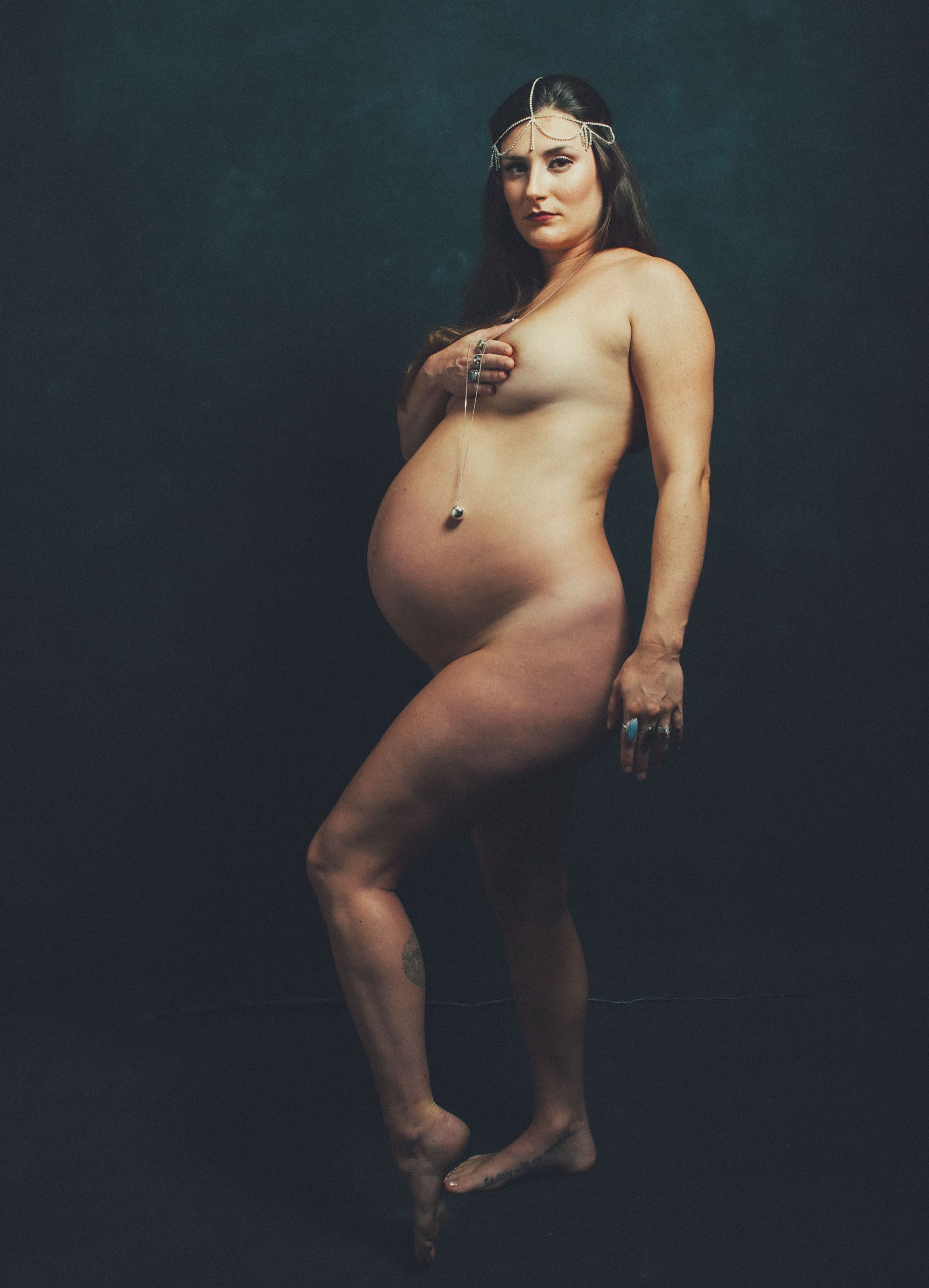 Best maternity photo pose in Asheville, NC studio