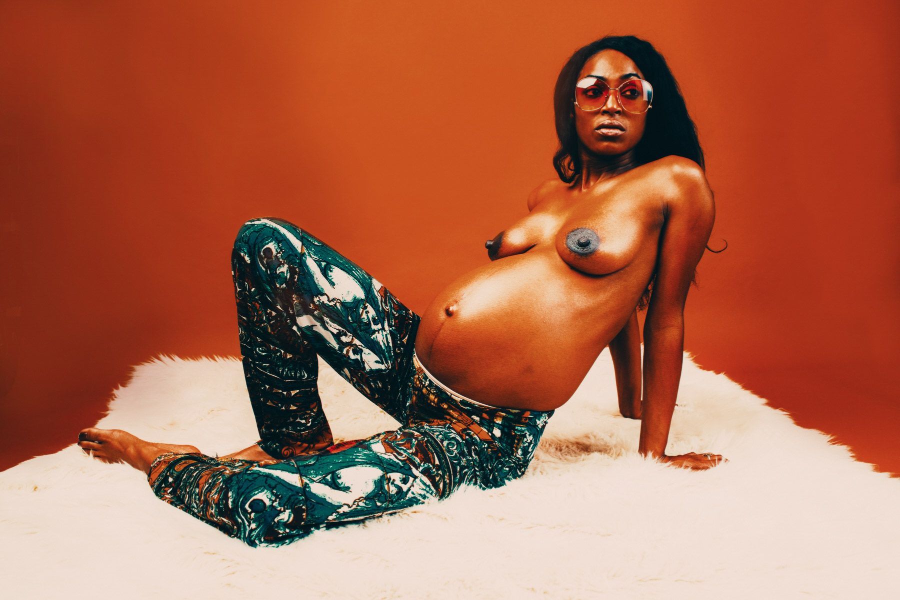 funky, colorful, modern pregnancy portrait of mother in elegant pose — WNC maternity photographer.