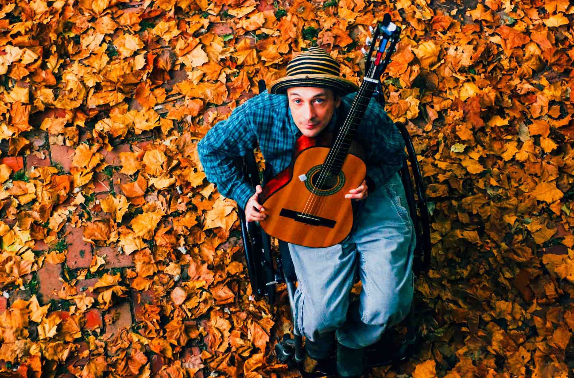 Vic Chesnutt portrait in leaves in Asheville, NC