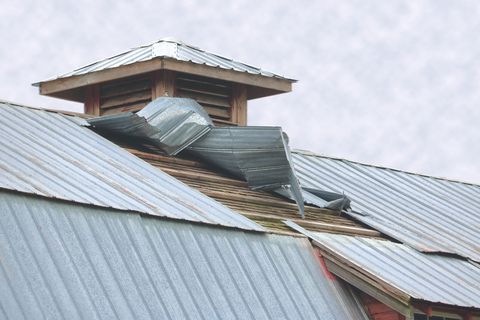 Storm damaged metal roof