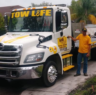 Roadside Assistance — Man Beside the Truck in Fleming Island, FL
