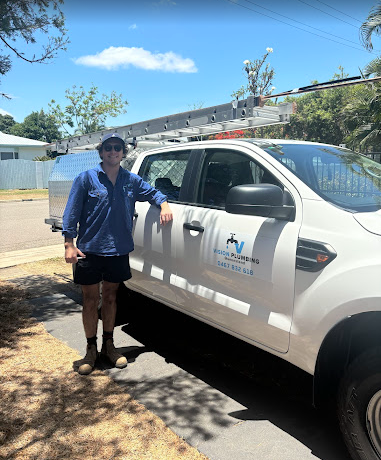 A Bunch of Plumbing Parts and Tools on a White Surface — Vision Plumbing Queensland in Pimlico, QLD
