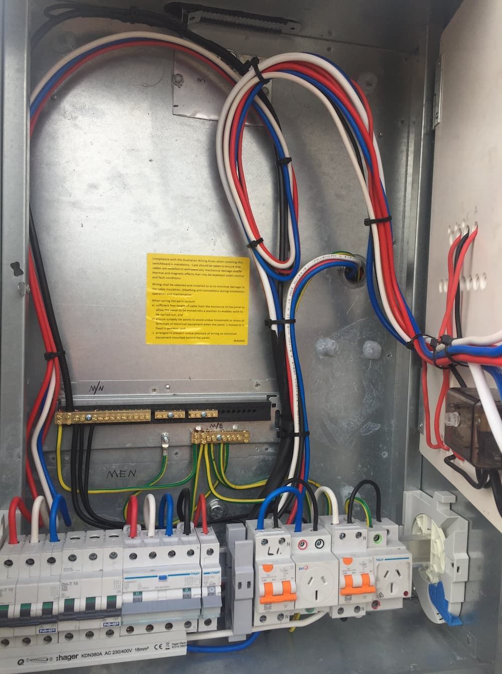 The Inside of a Electrical Box With a Lot of Wires Coming Out of It — Central Electrical Group in Gladstone Central, QLD