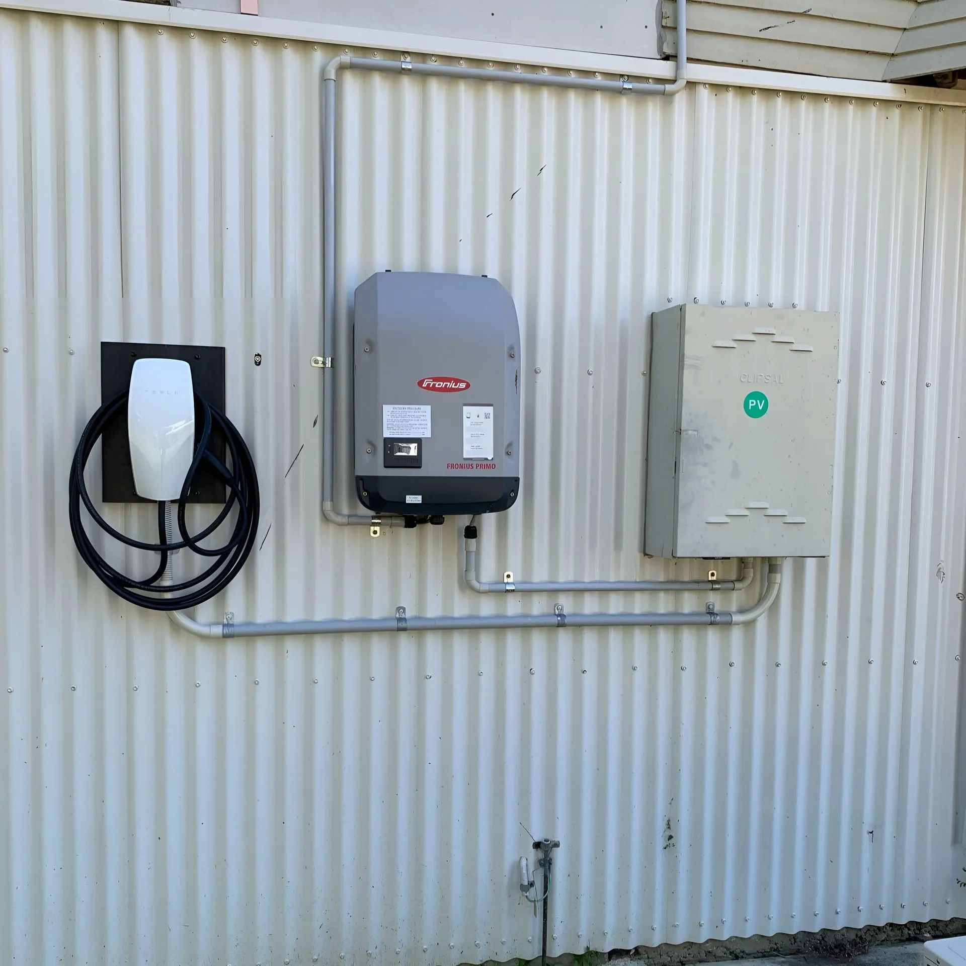 A White Wall With a Gray Box on It — Central Electrical Group in Gladstone Central, QLD