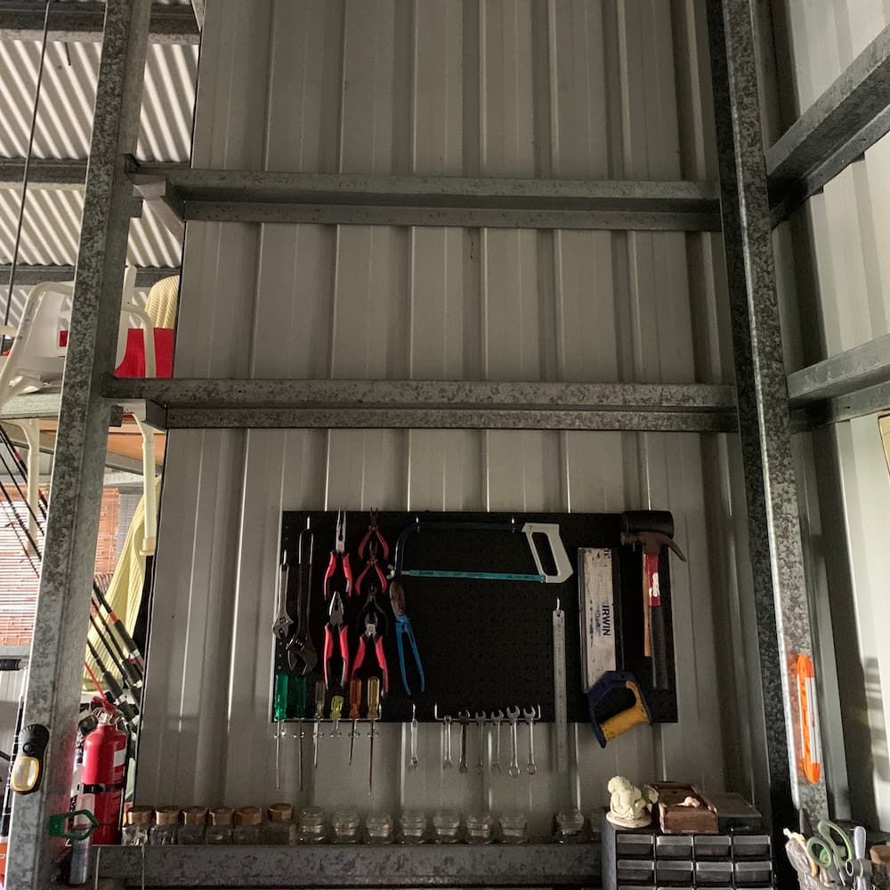 A Wall With a Bunch of Tools Hanging on It — Central Electrical Group in Gladstone Central, QLD