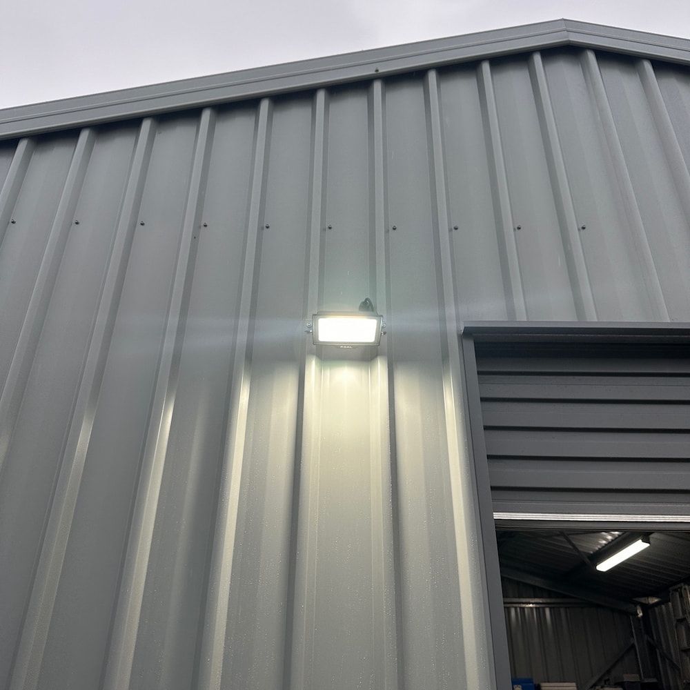 A Building With a Light on the Side of It — Central Electrical Group in Gladstone Central, QLD