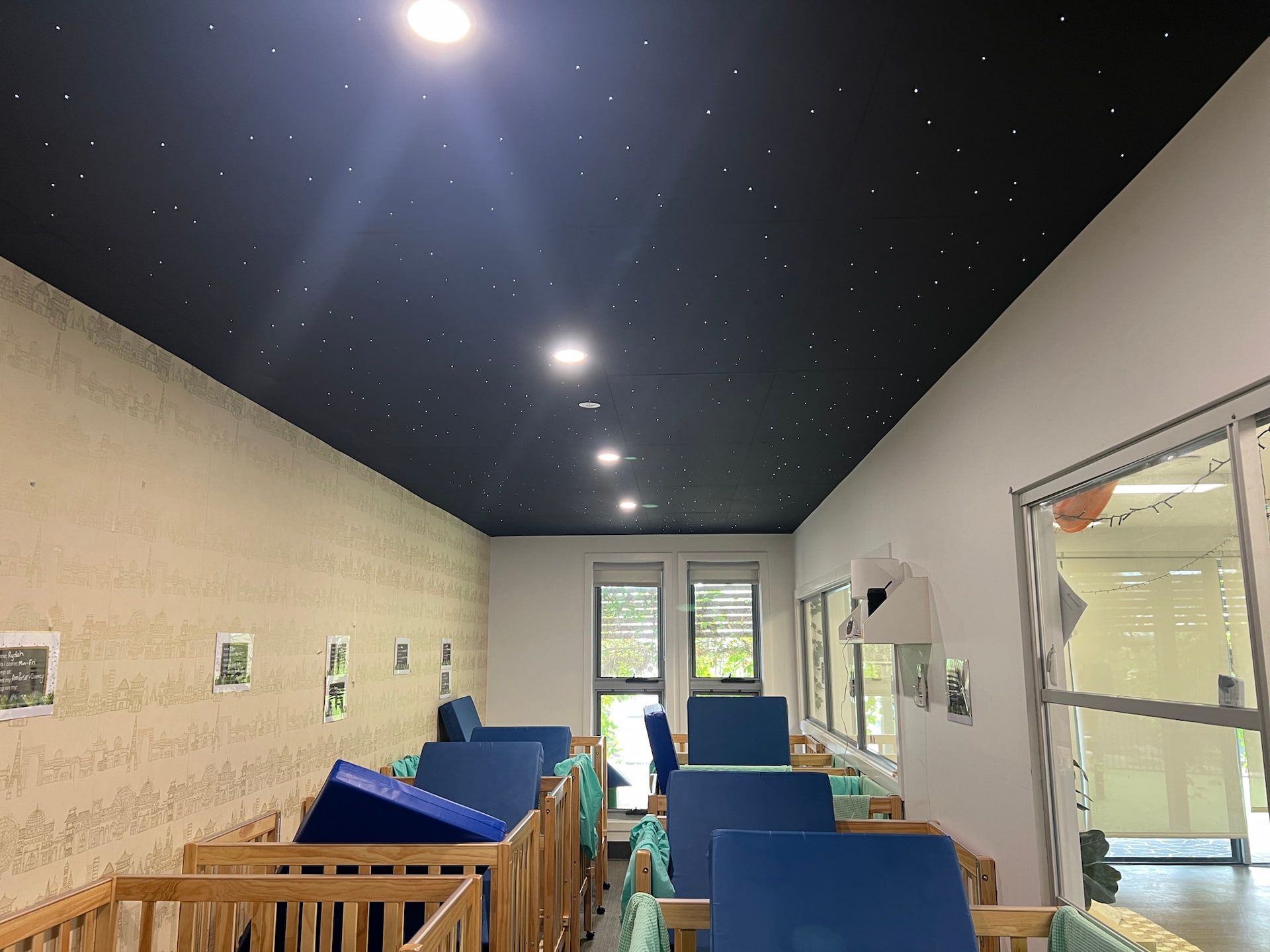 A Room With a Blue Ceiling and a Lot of Cribs — Central Electrical Group in Gladstone Central, QLD