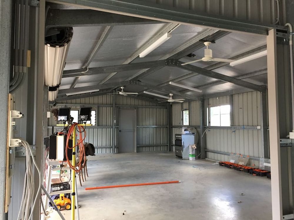 Interior of a Metal Shed With a Concrete Floor — Central Electrical Group in Gladstone Central, QLD