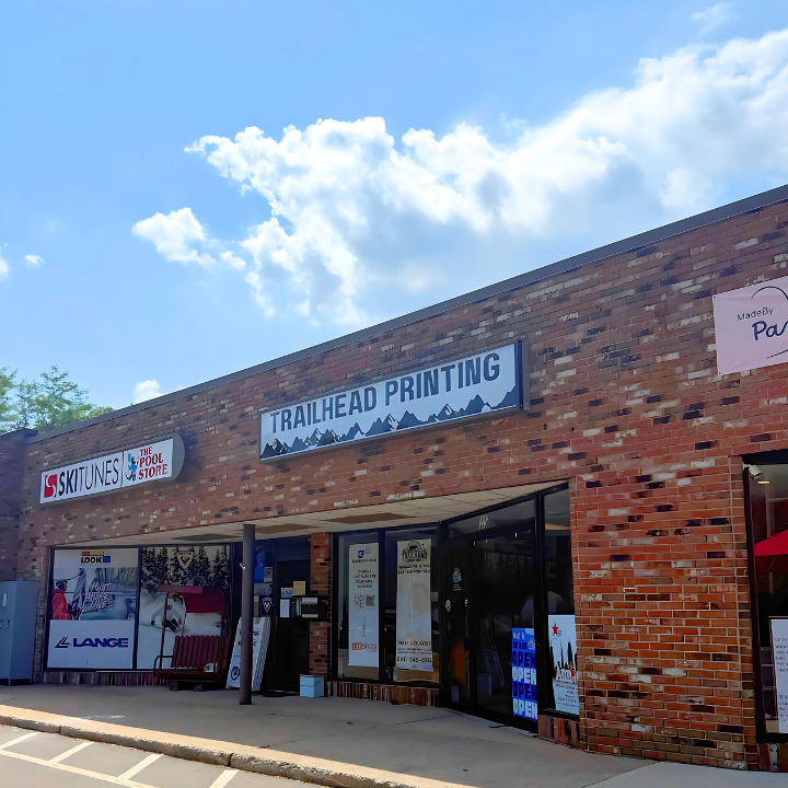 A brick building with a sign that reads 