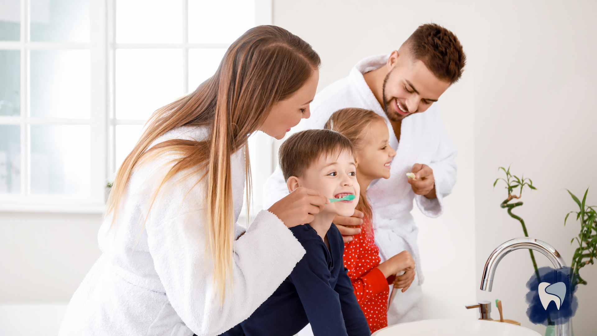 A family is brushing their teeth together in a bathroom.