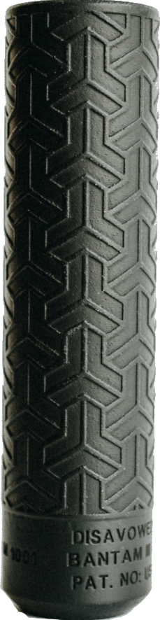 A black cylinder with a tire pattern on it.