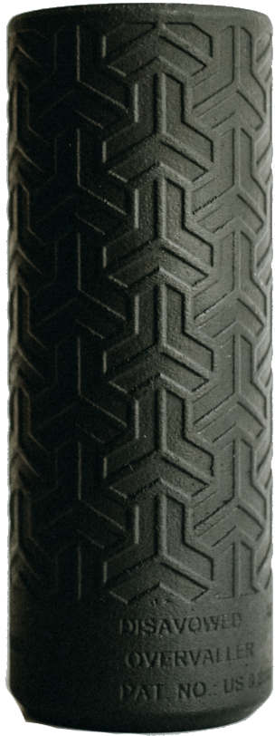 A black foam roller with a tire pattern on it.