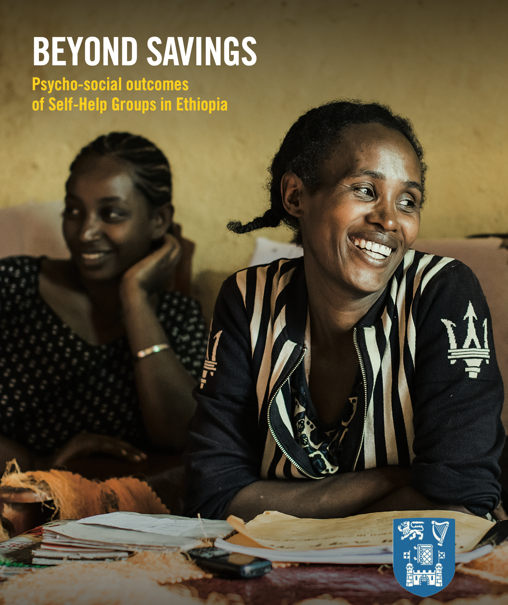 Two smiling women, one with her arm on the other's shoulder, in a room. Text: 