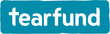 Tearfund logo with white text on a blue rectangular background.