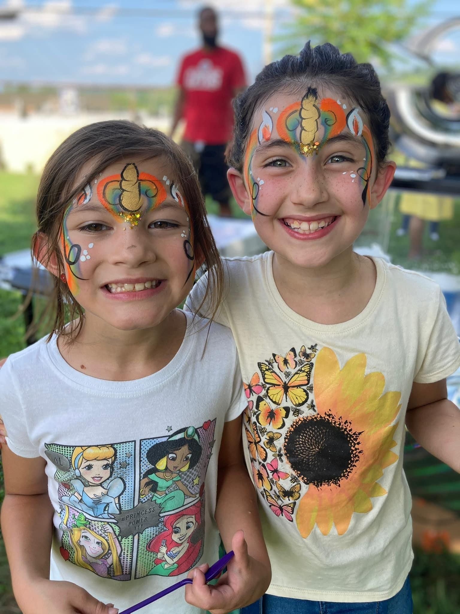young students at school with face paint