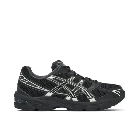 Black Asics GEL-1130 sneaker with silver accents on a white background.