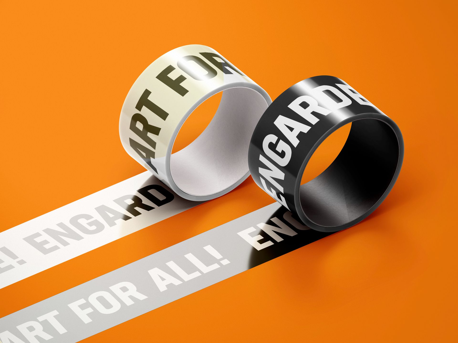 Twee rollen plakband, één wit en één zwart, met de tekst 