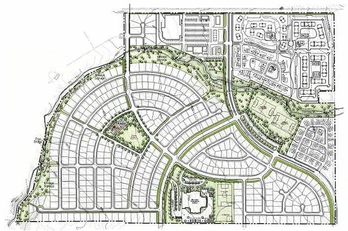 A detailed site plan for a residential development featuring curved street layouts, designated lots, and green spaces.
