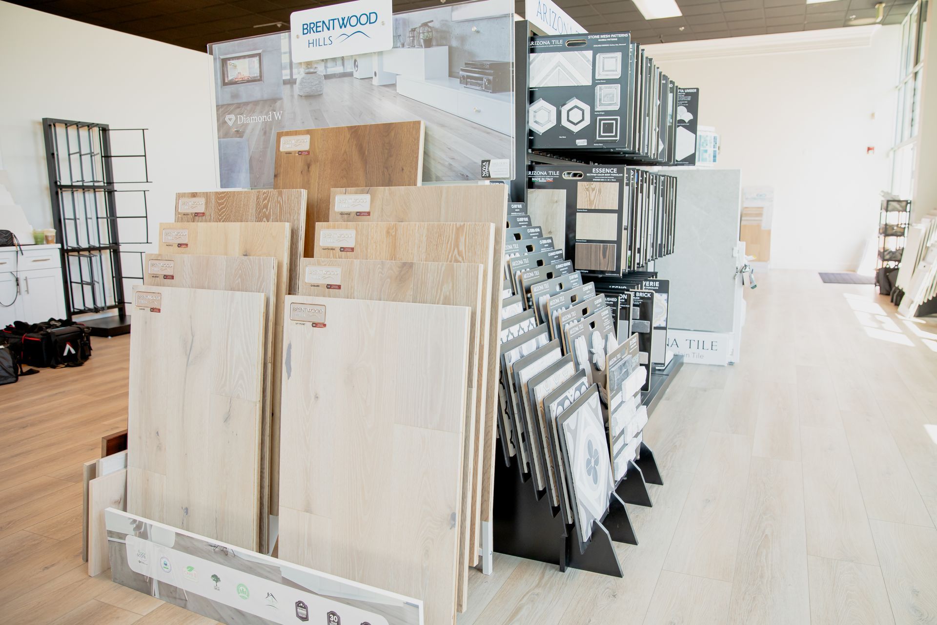 There are many different types of tiles on display in this store.