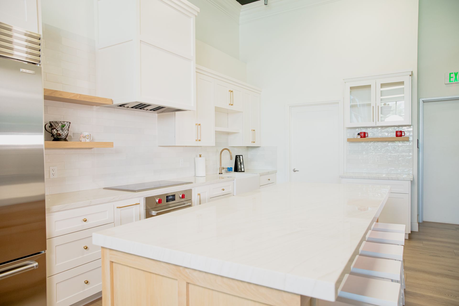 There is a large island in the middle of the kitchen.
