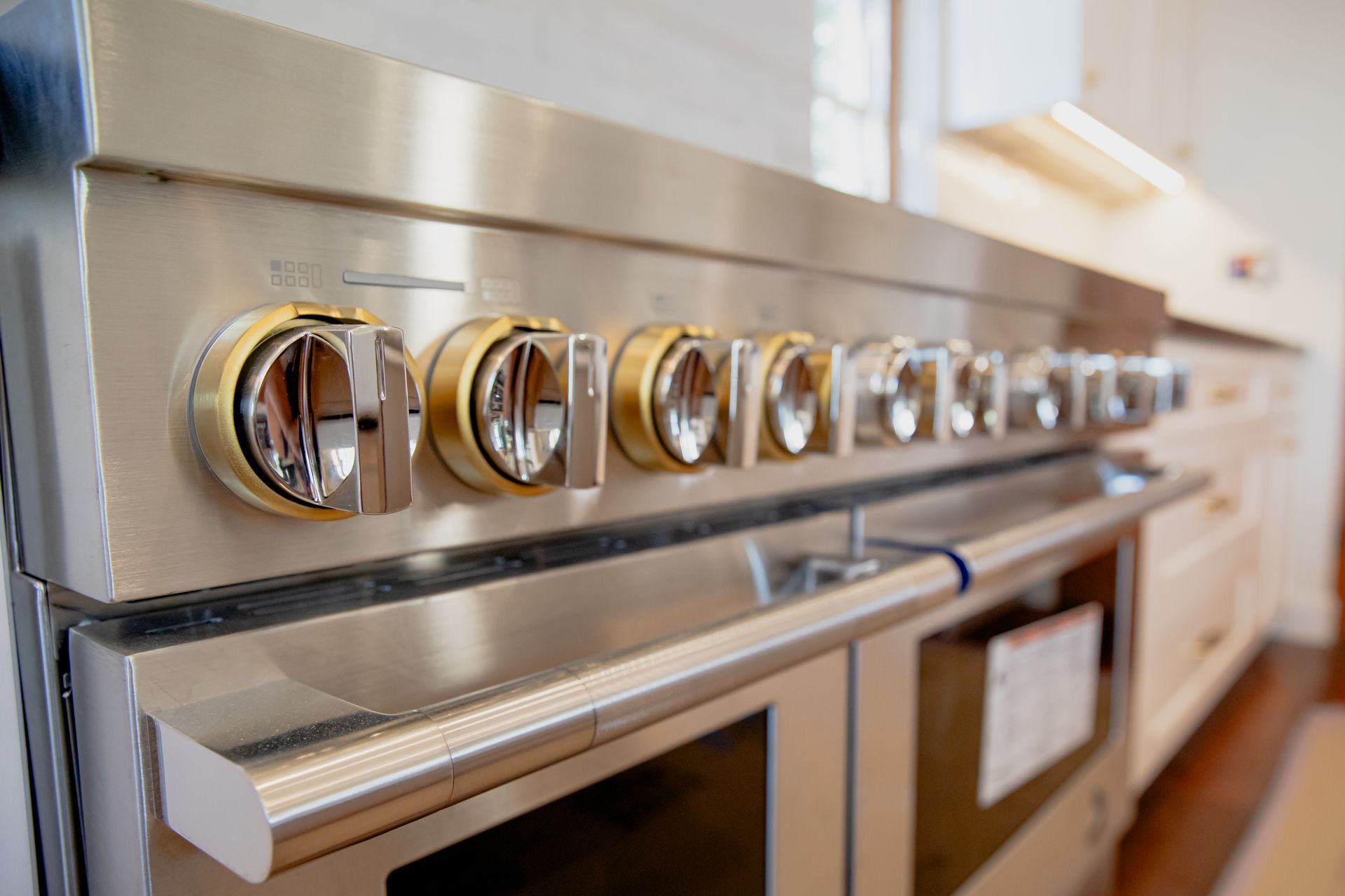 A close up of a stainless steel oven in a kitchen.