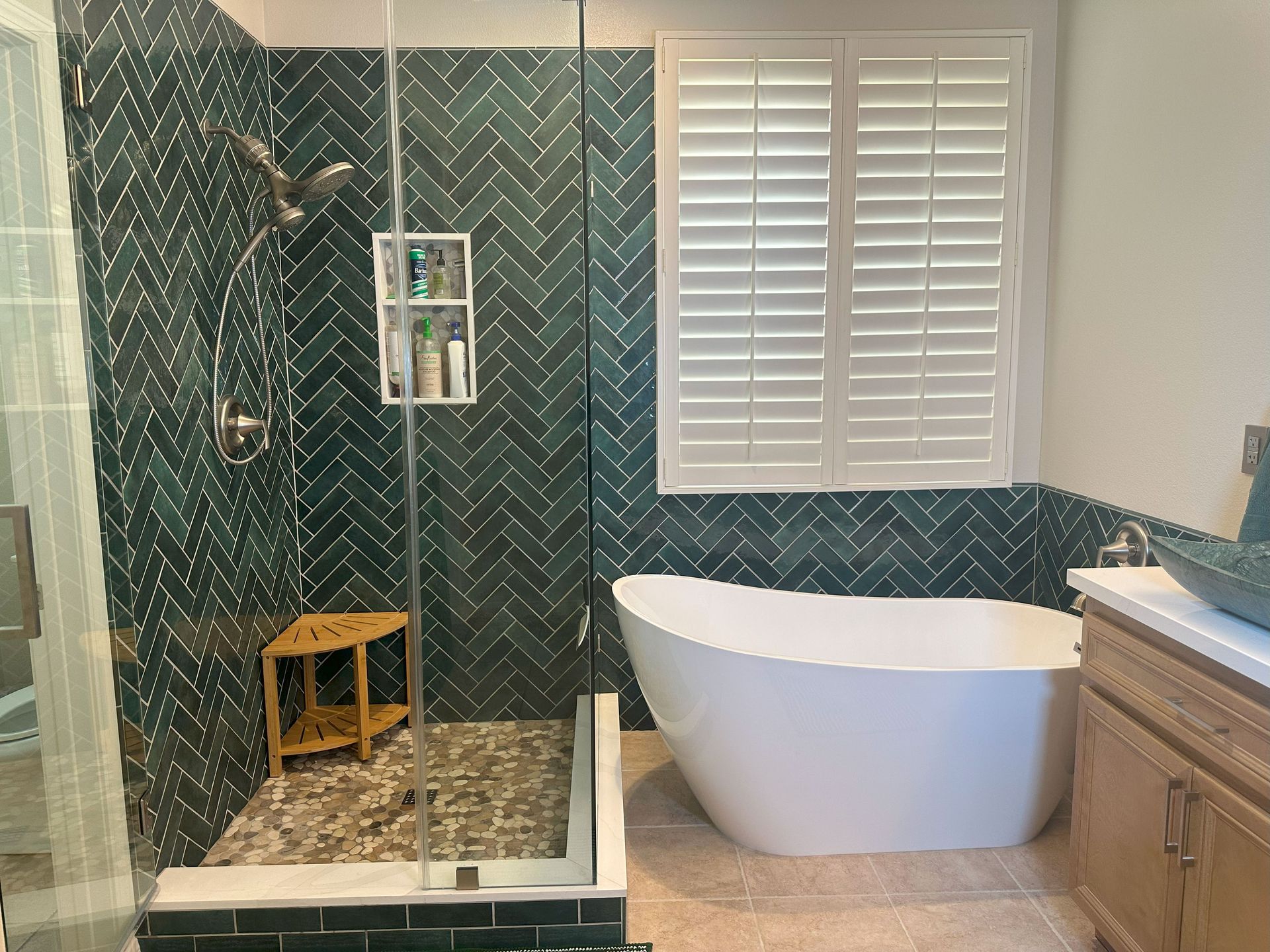 Bathroom remodel with emerald tiles