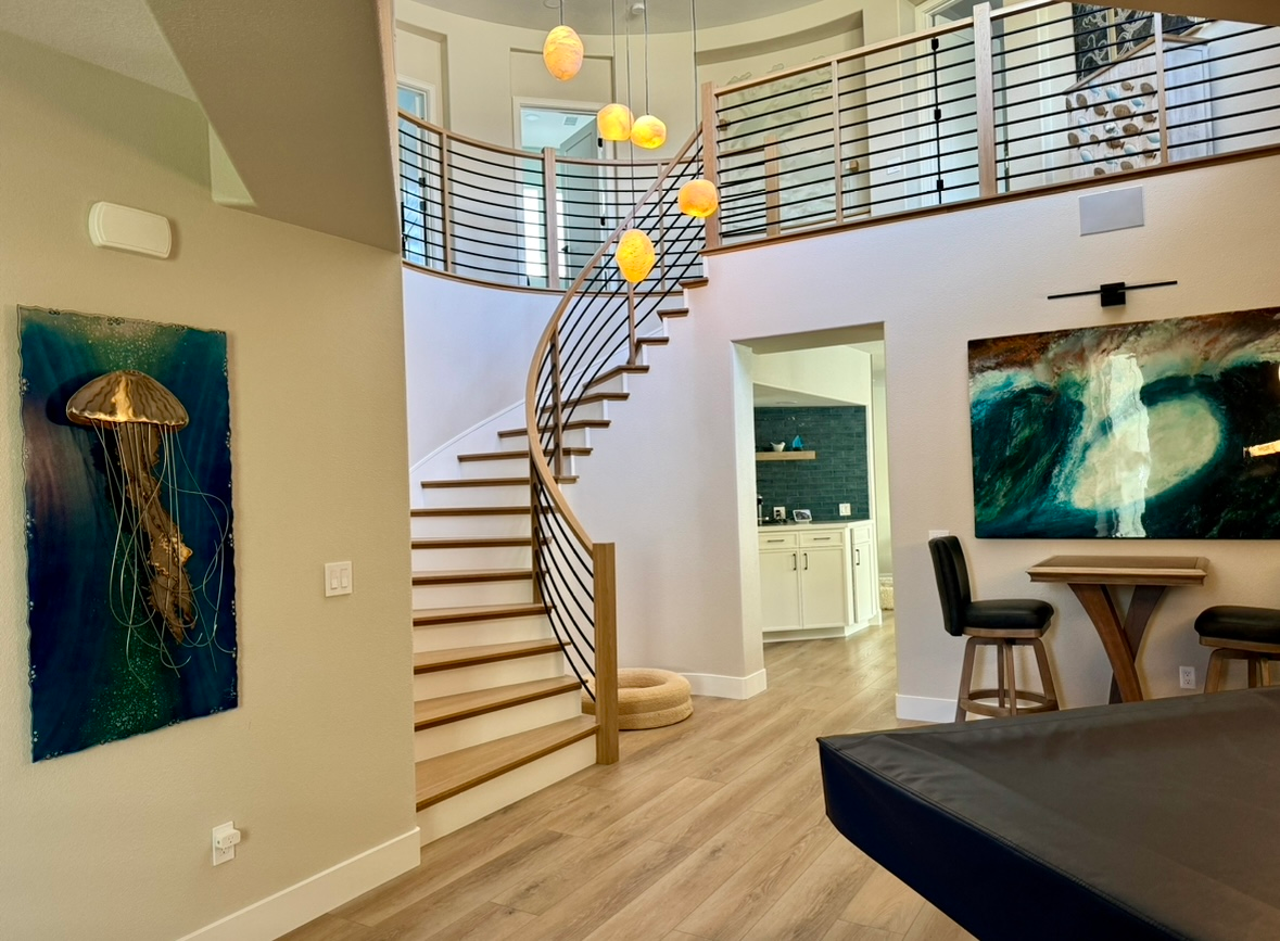 There is a pool table in the middle of the room.