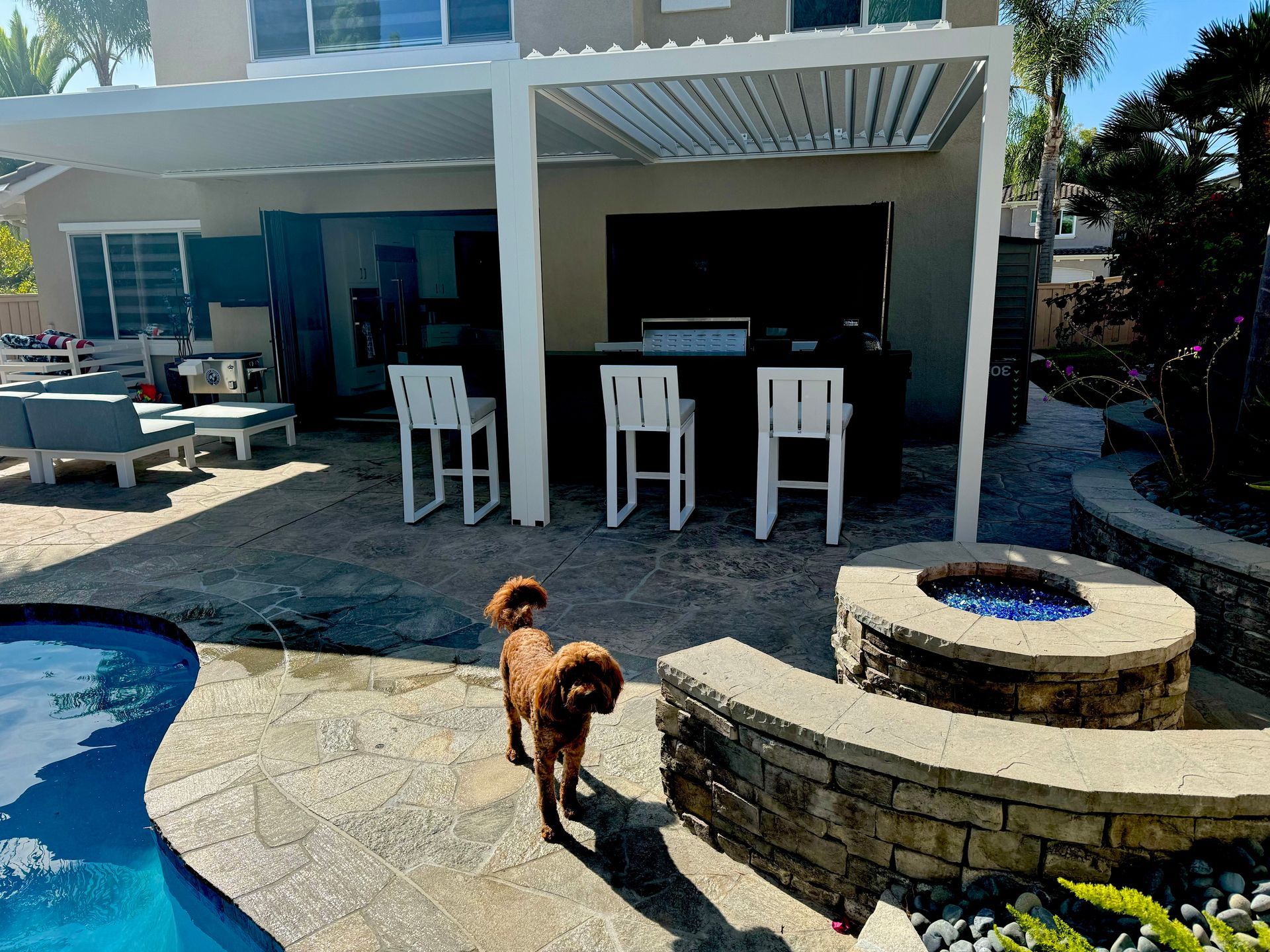 A man is standing on top of a wooden structure.