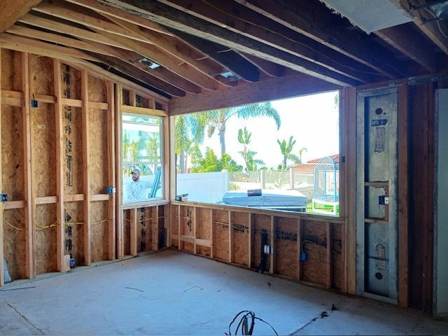 A room that is being built with a large window