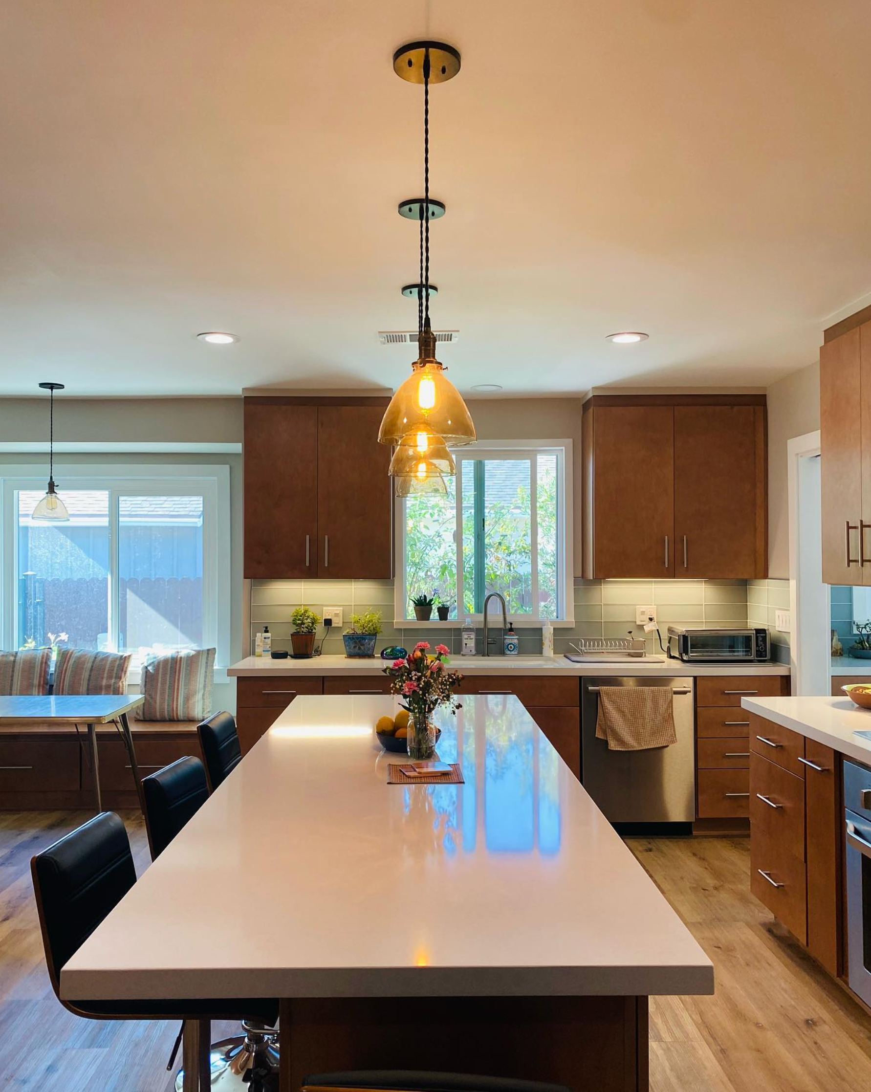 A kitchen with a large island in the middle of it