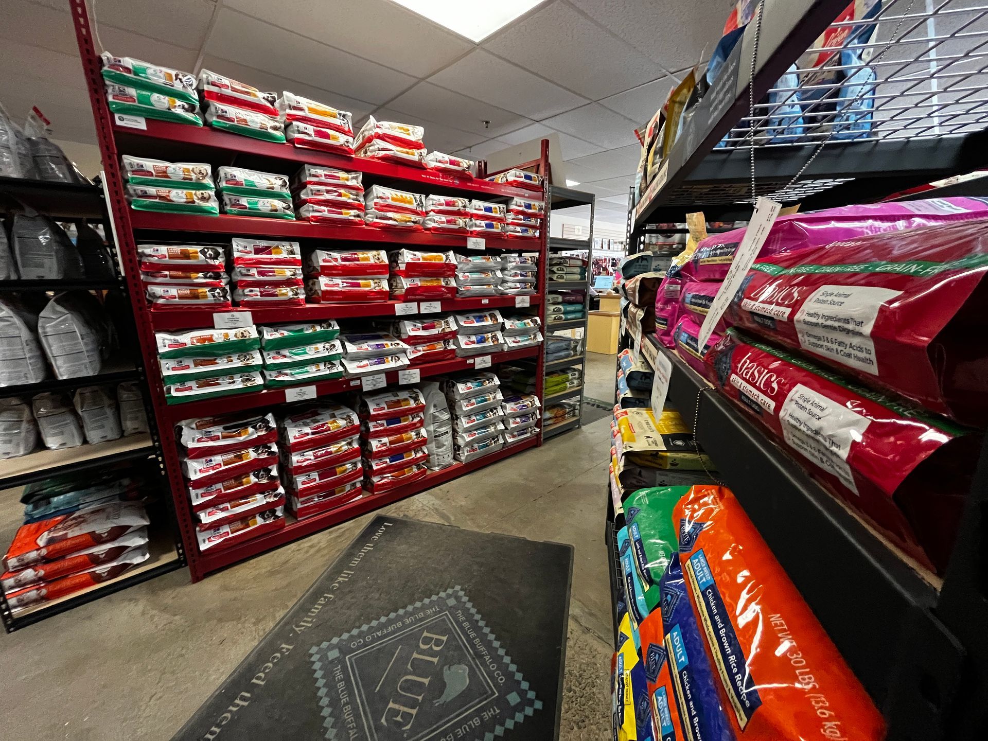 A store filled with lots of bags of dog food