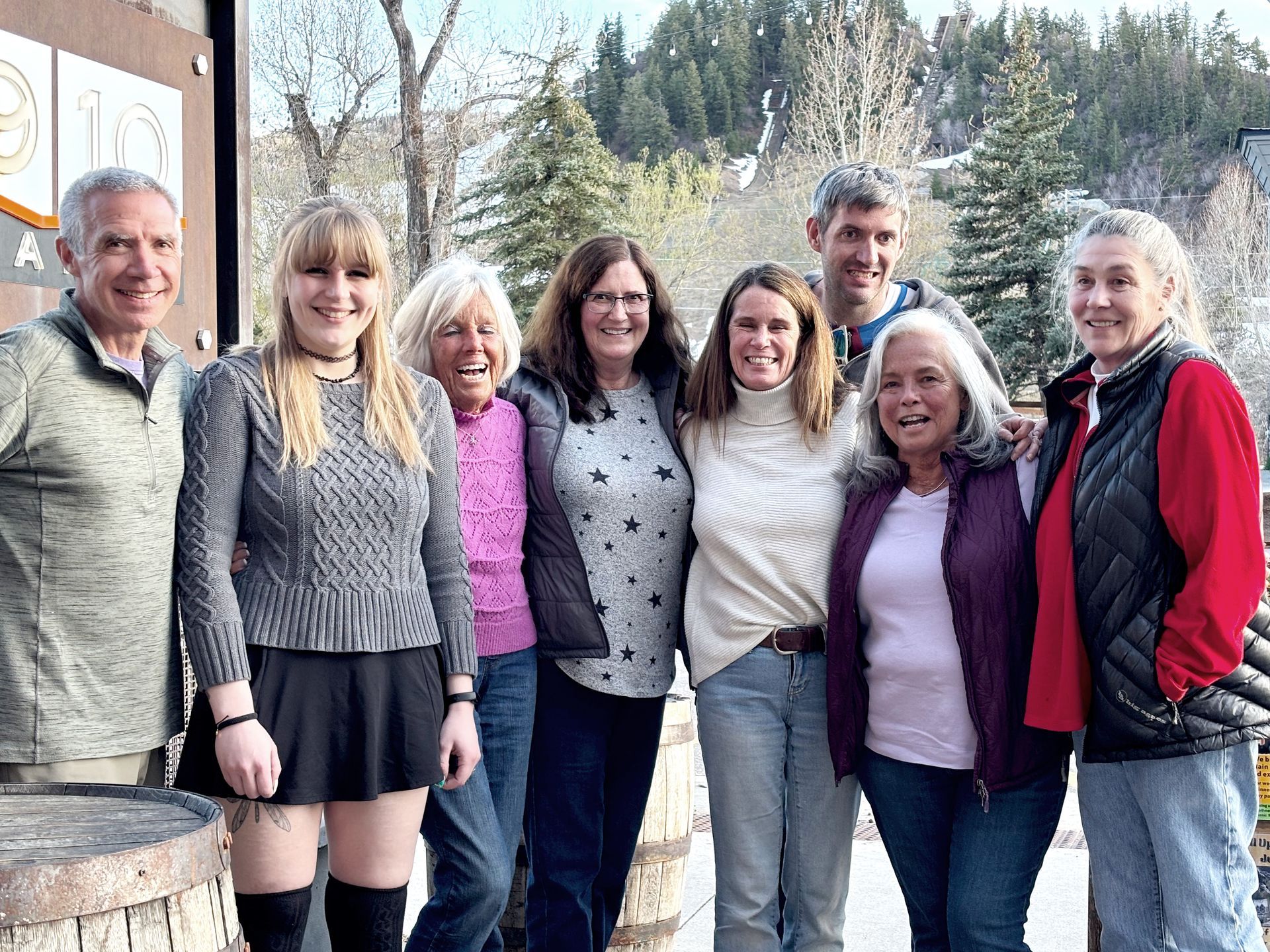 A group of people are posing for a picture together.