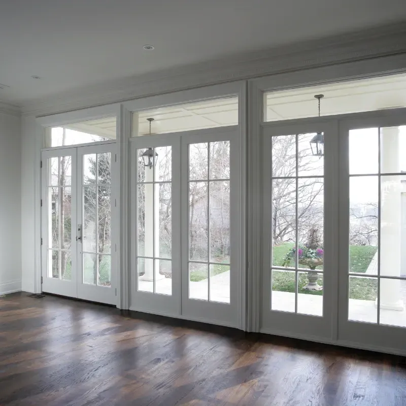 RSG Custom Builds empty room remodel in Seattle, WA with lots of windows and doors. Ideas and inspiration.