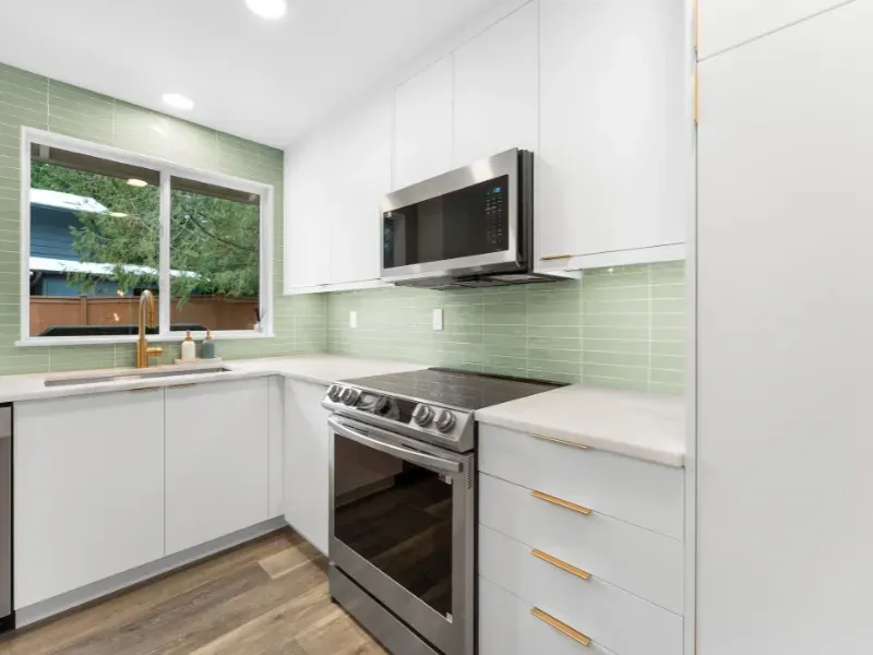 RSG Custom Builds kitchen remodel and ideas with white cabinets , a stove , a microwave , and a window. Ideas & inspiration.