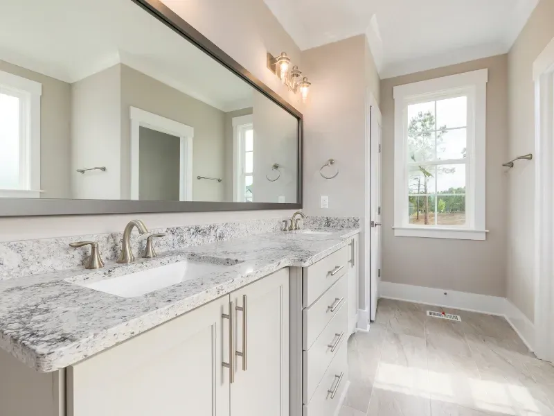 RSG Custom Builds bathroom remodel and installation in Seattle, WA with two sinks and a large mirror. Ideas and inspiration.