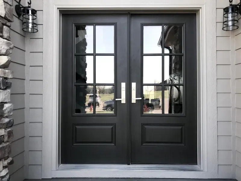 RSG Custom Builds door installation in Seattle, WA with a double door and lots of windows on a house. Ideas and inspiration.