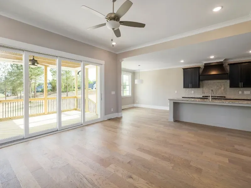 RSG Custom Builds with an empty living room with hardwood floors installation in Seattle, WA area. Ideas and inspiration.