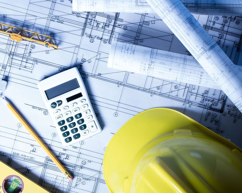 Hard Hat on Top of a Blueprint