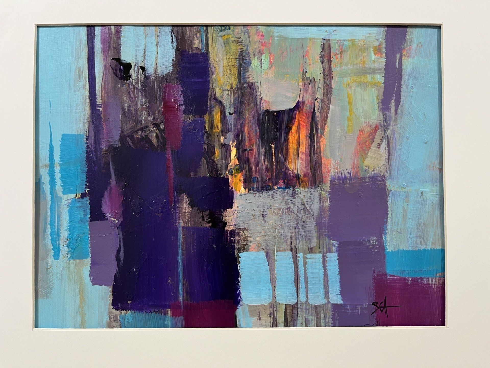 It is a painting of a purple and blue background.