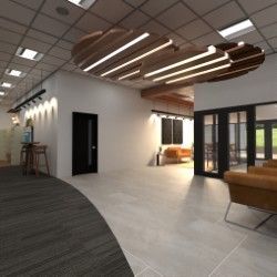 Modern office reception area with curved carpet, white walls, and wood accents, including a large ceiling fixture.