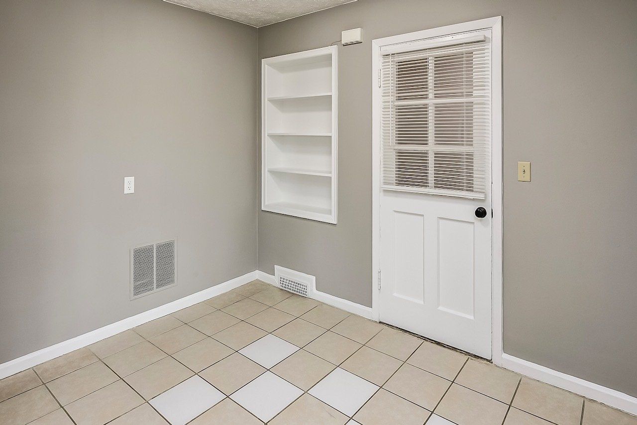 Maple Apartments Interior Photo with tile flooring