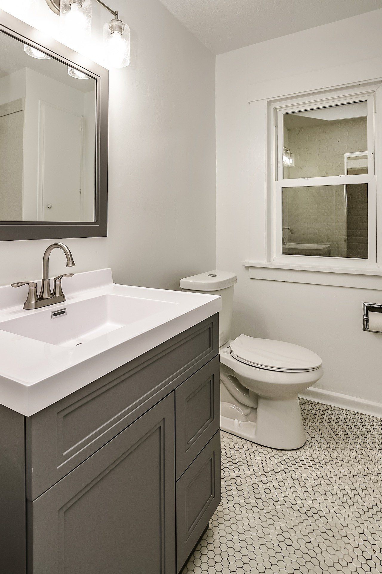 Dewey Apartment Homes Updated Bathroom Photo - 501