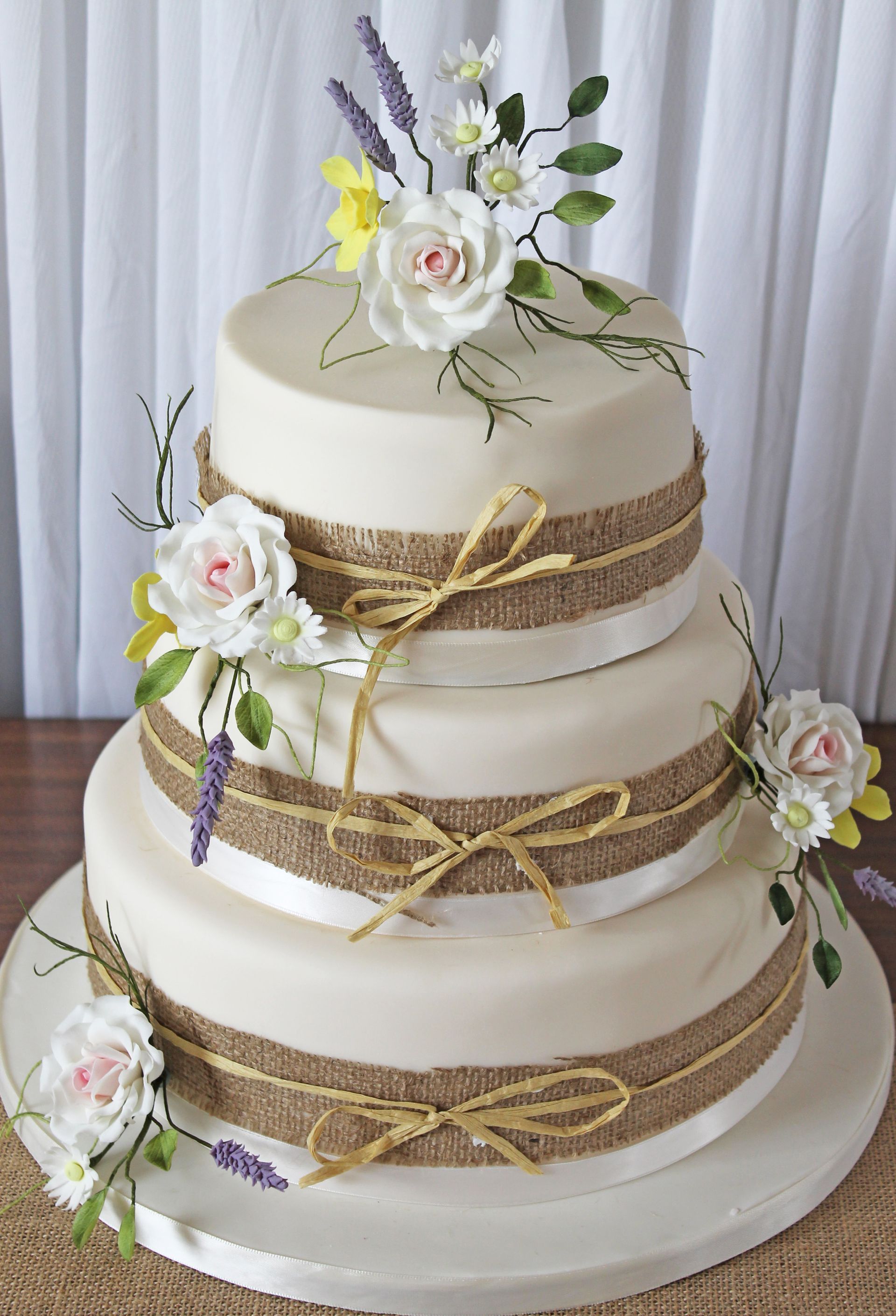3 Tier round with Rustic Wedding Flowers