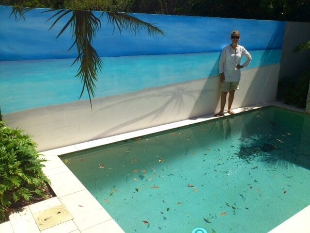 Paint Of An Ocean Next To Pool And A Woman — Artizans International Specialised Paint Finishes in Robina, QLD