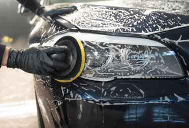 Buffing the headlights as part of our premium package in Langley, BC