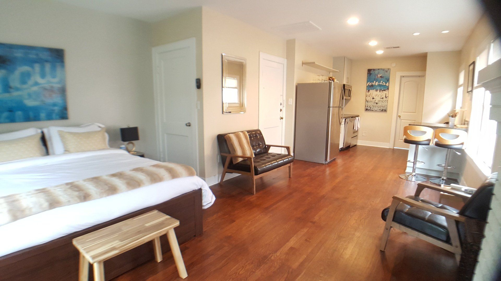 Bed and view of kitchen